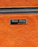 Orange Miu Miu Clutch