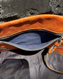 Orange Miu Miu Clutch